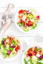 Healthy vegetable salad with fresh greens, lettuce, avocado, tomato, seet pepper and goat cheese. Delicious and nutritious diet d Royalty Free Stock Photo