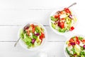 Healthy vegetable salad with fresh greens, lettuce, avocado, tomato, seet pepper and goat cheese. Delicious and nutritious diet d Royalty Free Stock Photo