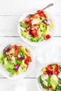 Healthy vegetable salad with fresh greens, lettuce, avocado, tomato, seet pepper and goat cheese. Delicious and nutritious diet d Royalty Free Stock Photo