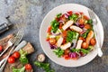 Healthy vegetable salad with grilled chicken breast, fresh lettuce, cherry tomatoes, red onion and pepper Royalty Free Stock Photo