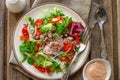 Healthy vegetable salad with lettuce, tomatoes and canned tuna Royalty Free Stock Photo