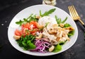 Healthy vegetable summer salad, fresh vegetables and chicken breast with yogurt dressing. Royalty Free Stock Photo