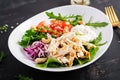 Healthy vegetable summer salad, fresh vegetables and chicken breast with yogurt dressing. Royalty Free Stock Photo