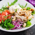 Healthy vegetable summer salad, fresh vegetables and chicken breast with yogurt dressing. Royalty Free Stock Photo