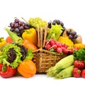 Healthy vegetables and fruits in willow basket isolated on white Royalty Free Stock Photo