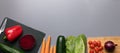 Healthy vegetables on a gray background with copy space. Banner Online shop concept