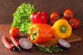 Healthy vegetables pepper tomato salad onion on rustic backgroun Royalty Free Stock Photo