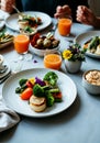 Healthy vegetarian breakfast with fresh vegetables and juice on a table setting Royalty Free Stock Photo