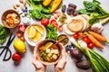 Healthy vegetarian food background. Vegetables, pesto and lentil curry with tofu