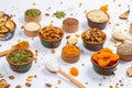 Healthy vegetarian food concept. Assortment of dried fruits, nuts and seeds on white background. Top view. Mixed nuts set closeup. Royalty Free Stock Photo