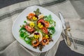 Healthy vegetarian summer salad with edible flowers