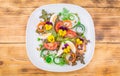 Healthy vegetarian summer salad with edible flowers