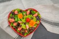 Healthy vegetarian summer salad with edible flowers