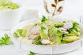 Healthy vegetarian vegetable salad of radish, cucumbers, lettuce. Royalty Free Stock Photo