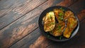 Healthy vegeterain Oven baked aubergines, Eggplant with parsley and herbs in a black plate Royalty Free Stock Photo