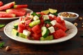 Healthy Watermelon, Cucumber Salad with Mint, pistachios nuts and feta cheese. Royalty Free Stock Photo