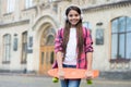 Healthy way of getting to your destination. Little girl hold penny board outdoors. Transportation concept. Wheeled sport