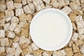 Healthy whole grain cereal with bowl of milk Royalty Free Stock Photo