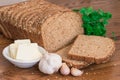 Healthy wholemeal bread, garlics and butter. Royalty Free Stock Photo