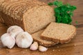 Healthy wholemeal bread, garlics and parsley. Royalty Free Stock Photo