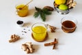 Healthy winter beverage with ginger, turmeric, cinnamon stick, lemon, honey and black pepper Royalty Free Stock Photo