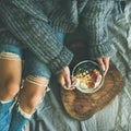 Healthy vegetarian winter breakfast in bed concept, top view Royalty Free Stock Photo