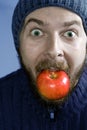 Healthy winter nutrition concept - man and apple