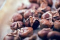 Healthy winter snack chestnuts on wooden background Royalty Free Stock Photo