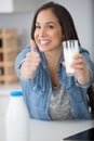 healthy woman drinking glass milk thumbs up Royalty Free Stock Photo