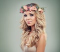 Healthy Woman with Flowers, Blonde Curly Hairstyle Royalty Free Stock Photo