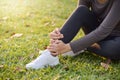 Healthy Woman Injured on her ankle. Royalty Free Stock Photo