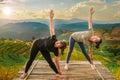 Healthy woman lifestyle balanced practicing meditate and zen energy yoga outdoors on the bridge in morning the mountain nature. Royalty Free Stock Photo