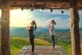 Healthy woman lifestyle balanced practicing meditate and zen energy yoga outdoors on the bridge in morning the mountain nature. Royalty Free Stock Photo