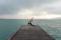 Healthy woman lifestyle balanced yoga practicing meditate and energy on the bridge in morning Royalty Free Stock Photo