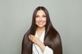 Healthy woman with long brown straight hair on white background. Haircare concept Royalty Free Stock Photo