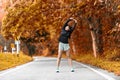 Healthy woman relax after cool down and looking away in the road outdoor.