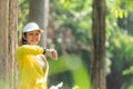 Healthy woman relax after cool down and looking smart watch for check timing run.