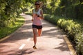 Runner running on morning park road workout jogging Royalty Free Stock Photo