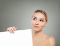 Healthy woman smiling and holding empty white card singboard Royalty Free Stock Photo