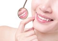 Healthy woman teeth and a dentist mouth mirror Royalty Free Stock Photo