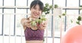 Healthy woman workout holding organic salad bowl healthy lifestyle. Wellness Asian women dressing organic green salad tomato Royalty Free Stock Photo