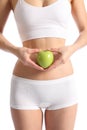 Healthy womans body white underwear holding apple