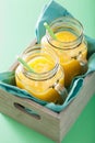 Healthy yellow smoothie with mango pineapple banana in mason jar Royalty Free Stock Photo