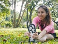 Healthy young asian woman exercising at park. Fit young woman doing training workout in morning. Royalty Free Stock Photo