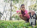 Healthy young asian woman exercising at park. Fit young woman doing training workout in morning. Royalty Free Stock Photo