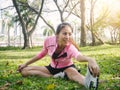 Healthy young asian woman exercising at park. Royalty Free Stock Photo