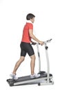 Healthy Young Man Workout on Treadmill Royalty Free Stock Photo