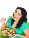 Healthy Young Woman Eating a Fresh Crisp Mixed Garden Salad Royalty Free Stock Photo