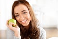 Healthy young woman holding green apple Royalty Free Stock Photo