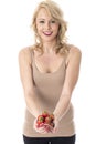 Healthy Young Woman Holding a Handful of Fresh Strawberries Royalty Free Stock Photo